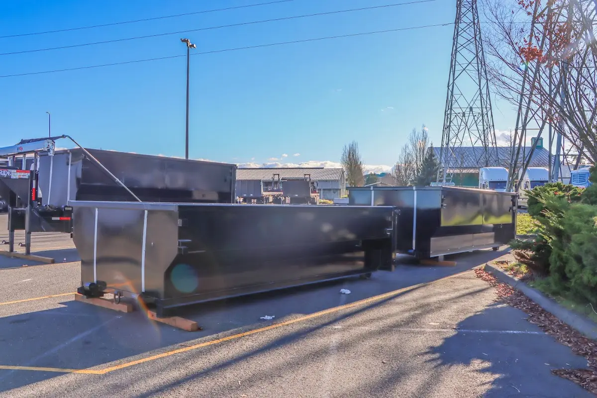 Roll-off dumpster ready for waste disposal at job site for Construction Dumpster Rental in Irondale